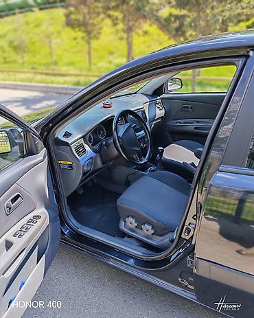 Kia: Kia Rio: 1.4 l | 2006 il Sedan — 10