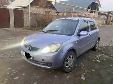 Mazda: Mazda Demio: 2005 г., 1.3 л, Автомат, Бензин, Седан