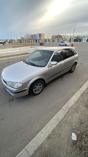 Mazda: Mazda 323: 1998 г. — 7