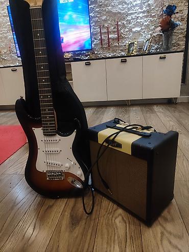 gitara elektro: 1 ildir alinmisdir, usaq istifadə edə bilmədiyindən təcili satilir — 1