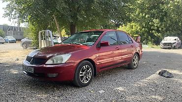rota grid: Mitsubishi Lancer: 2005 г., 1.6 л, Автомат, Газ, Седан — 5