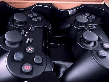 фото 3 на 4: Игровая приставка Game Stick Lite с беспроводными геймпадами - — 2