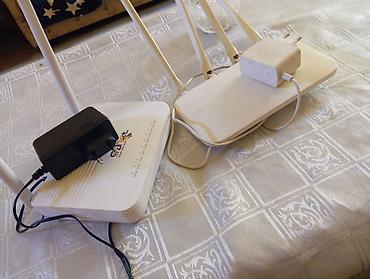 router qiymetleri: İki ədəd Wi‑Fi marşrutizator və adapterləri.Razilasma yolu ilə Təcili — 1