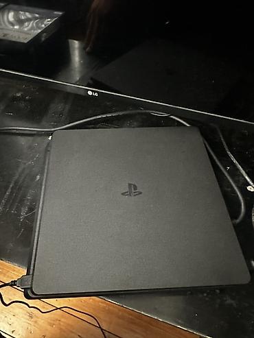 oyun komputerlər: Sony PlayStation 4 Slim oyun konsolu Xüsusiyyətlər: - Kompakt “Slim” — 2