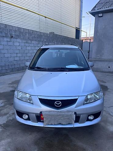 саната желтый: Mazda PREMACY: 2004 г., 1.8 л, Механика, Бензин, Универсал — 4