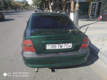 Opel: Satılır Opel vektra 1997 avtomat qiymət 4800 asaqi yeridə var