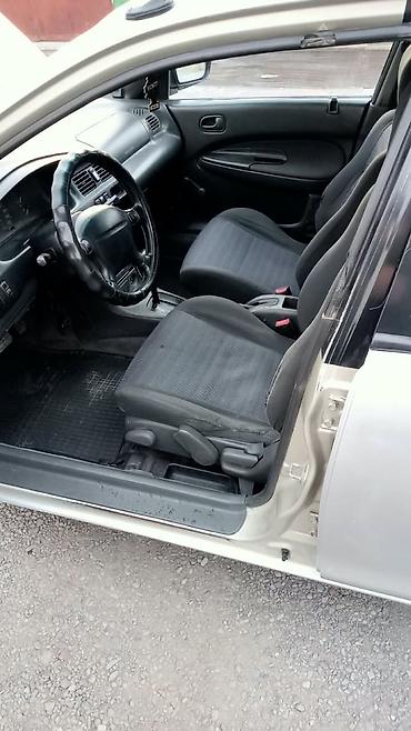 smart plus: Mazda 323: 1995 г., 1.5 л, Автомат, Бензин, Седан — 5