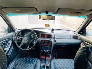 Kia: Kia Sephia sedan - Kuzov: 4 qapılı sedan, tünd yaşıl rəng - Ön hissə — 9