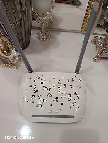 modem router tp link: TP-Link Wi‑Fi router - Model: TP-Link (üzərində brend loqosu var) - — 1