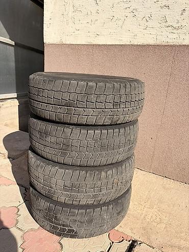 225 55: Комплект зимних шин Dunlop - Размер: 195/65 R15 - Индекс — 1