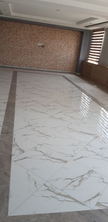 Plitə işləri: Hər növ Kermoqranitlərin vurulması — 2