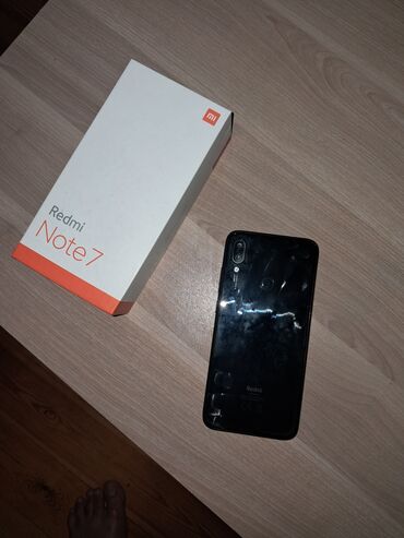 Xiaomi tərəfindən istehsal olunan Redmi Note 7 smartfonu, qara rəngdə
