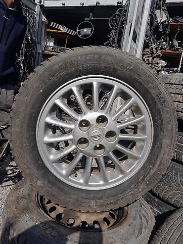 Литой диск Nissan с зимней шипованной шиной Michelin. Характеристики