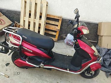 Скутеры: Электроскутер (класс 50–150 см³ эквивалент), городской Описание: - — 3