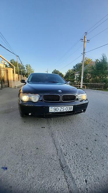 100lt hava kompresoru: BMW 7 Series (E65) – qara rəng, sedan gövdə. - Xarici: klassik BMW — 3