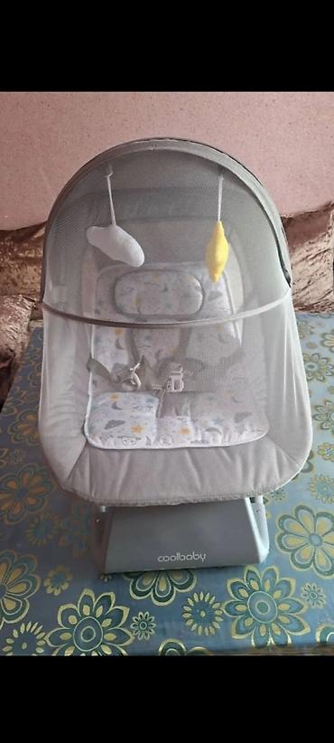 Детские качели: Электрокачель Coolbaby + прогулочная коляска 1) Детская электрокачель — 1