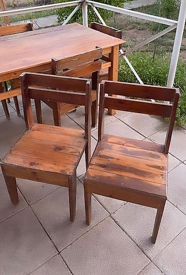 mebel stol stul: Tecili satilir. Taxta lakli. Uzun 10 neferlik masa. 10 oturacaq. Bu — 3
