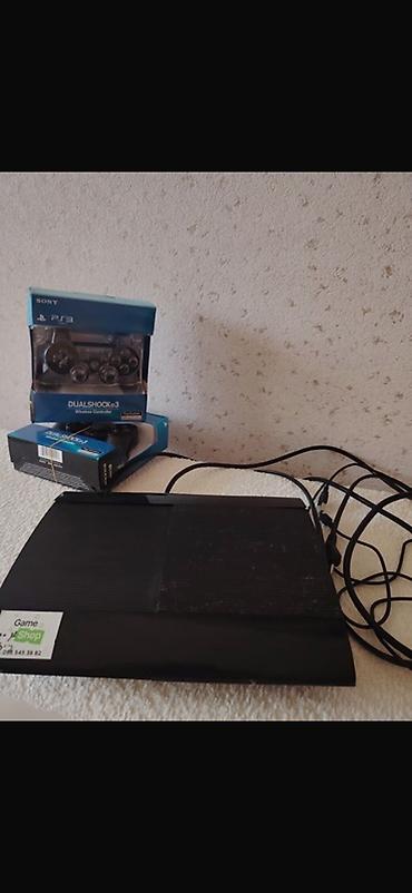 ps 3 cd: Sony PlayStation 3 Super Slim konsolu + 2 ədəd DualShock 3 simsiz pult — 1