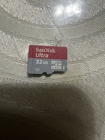ssd накопители: Карта памяти SanDisk Ultra microSDHC UHS-I объемом 32 ГБ. Подходит для