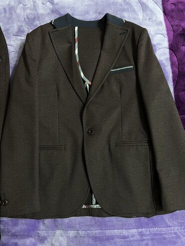 Dəstlər: Kostyum yenidir, 1 dəfə geyinilib. 10-11 yaşlı uşaqlar üçündür. 255 — 2