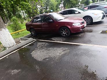 demio sport: Mazda 323: 2001 г., 1.8 л, Автомат, Бензин, Седан — 2