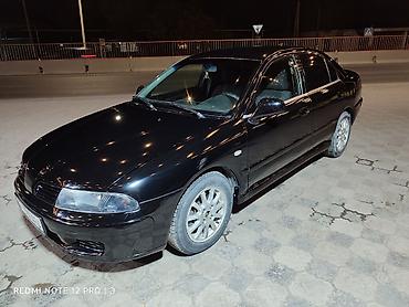 диска на авто: Mitsubishi Carisma: 2003 г., 1.8 л, Автомат, Бензин, Лифтбек — 6