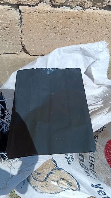 dəniz məhsulları satışı: Qara rəngli çoxqatlı folqa paketlər - Material: qalın, elastik — 1