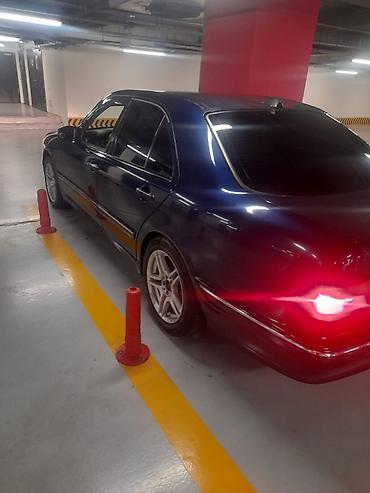 Mercedes-Benz E-Class sedan (W210) - Kuzov: tünd mavi, 4 qapılı sedan