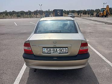 cruze radiator: Opel Vectra sedan kuzovlu minik avtomobil. Rəngi qızılı-bej — 2