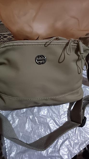 Классические сумки: Продаётся женская сумочка с длинным ремнём,материал плащёвка мягкая at lalafo.kg — 9 Классические сумки: Продаётся женская сумочка с длинным ремнём,материал плащёвка мягкая — 9