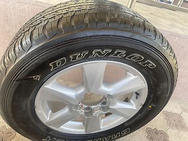 112 5: Колесо в сборе: шина + литой диск - Шина: Dunlop Grandtrek AT22 - — 4