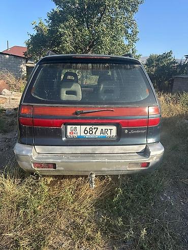вмятина: Mitsubishi Delica: 1993 г., 2 л, Механика, Бензин, Минивэн — 5