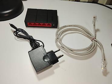 Модемы и сетевое оборудование: Коммутатор гигабитный с 5 портами Mercusys MS105G 10/100/1000 Мбит/с — 2