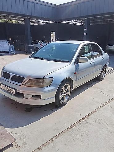 mitsubishi montero: Mitsubishi Lancer: 2002 г., Бензин, Седан — 9