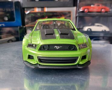 Avtomobil modelləri: Коллекционная модель Ford Mustang Street Racer Green black 2014 — 3