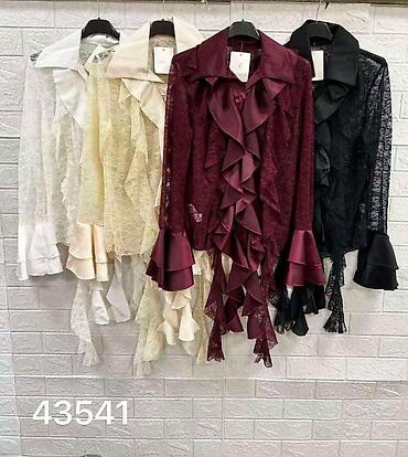 elastin poliamid: Ženska elegantna čipkana bluza sa volanima

Kosulja: 2.700 dinara — 6