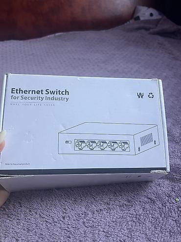 akses point: Dahua PoE Switch – DH-PFS3005-4P-58 Xüsusiyyətlər: - 4x PoE portu + — 2