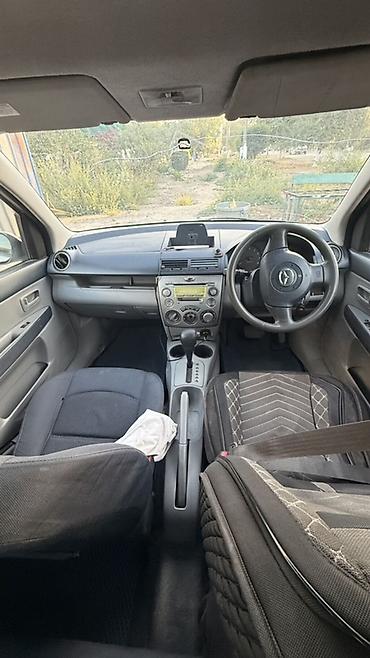 мотоцикл полуавтомат: Mazda Demio: 2004 г., 1.3 л, Автомат, Бензин, Хэтчбэк — 2