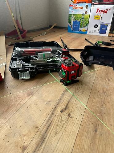 Лазерные уровни: Лазерный нивелир с зеленым лучом в комплекте с защитным оранжевым — 5