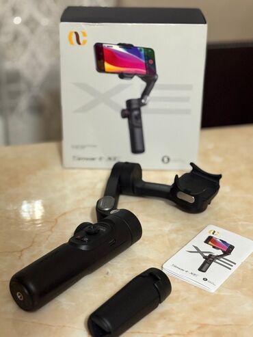 işdenmiş telfonlar: Bu, üç oxlu "Smart-XE" smartfon stabilizatorudur. O, mobil cihazlar