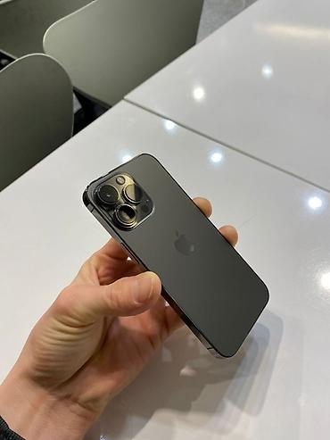 Apple iPhone: IPhone 13 Pro, Black Titanium, 84 % — 3