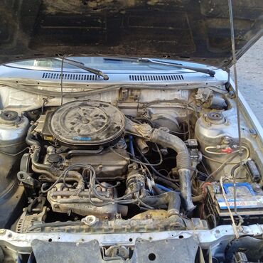 Mazda: Mazda 2: 1987 г., 2 л, Механика, Газ, Седан — 10