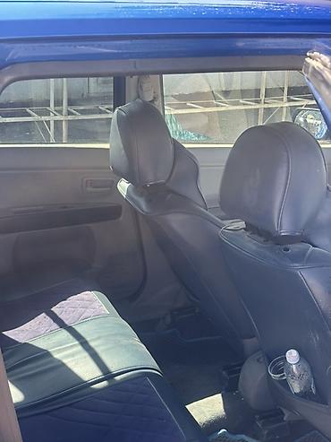 мисубиси спейс стар: Mazda Demio: 2002 г., Автомат, Бензин, Хэтчбэк — 5