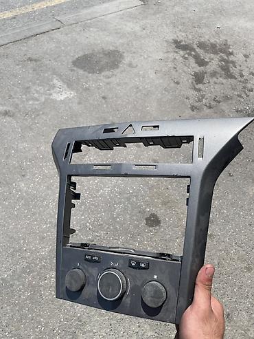 chevrolet cruze motor: Chevrolet Cruze (2009-2014) üçün mərkəzi konsol paneli və iqlim — 2
