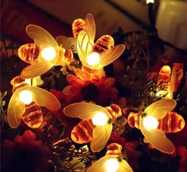 Rasveta: Solarne lampice 
Cvet i pcele solarne
5m
Cena: 2400din v — 2