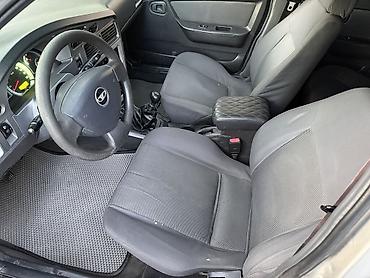 Унаа: Daewoo Nexia: 2009 г., 1.5 л, Кол менен иштөөчү, Бензин, Седан — 9