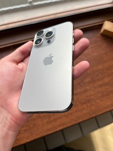 iphone 12 baki: IPhone 15 Pro, Natural Titanium, Face ID — 7