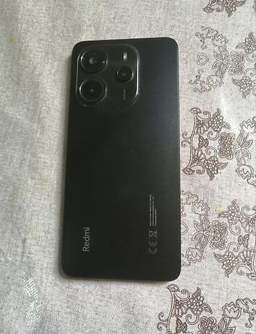 14 pro max kabro: Redmi smartfon Xüsusiyyətlər: - Arxa tərəfdə üçlü kamera modulu və — 2