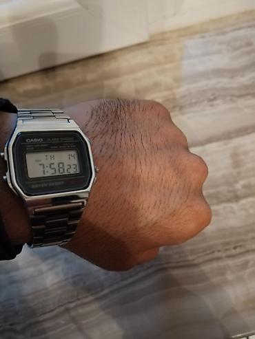 budilnik saat: Casio metalik seliqeli saatdi. Az islenib ela veziyyetdedi. ekran — 1