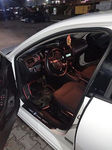 volkswagen qolf: Volkswagen Jetta: 1.8 l | 2014 il Sedan — 9